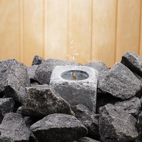 Hukka-SaunaSimo-Sauna-Fountain-Essence-Diffuser-on-Stones